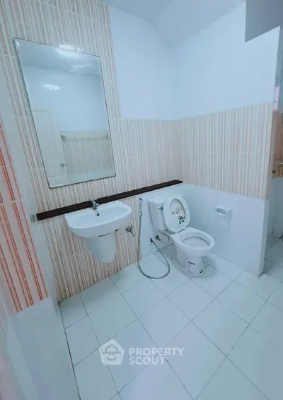 Modern bathroom with sleek fixtures and stylish tile design