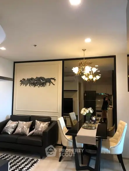 Stylish living room with elegant decor and modern dining area, perfect for contemporary living.