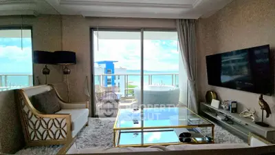 Luxurious living room with stunning ocean view and elegant decor