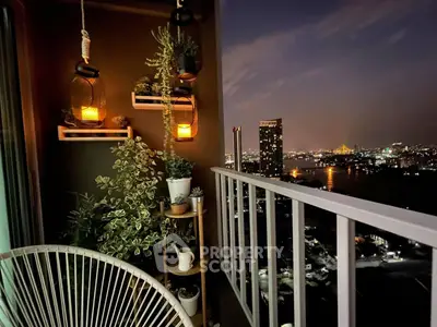 Charming balcony with city skyline view, perfect for relaxation and enjoying the night lights.