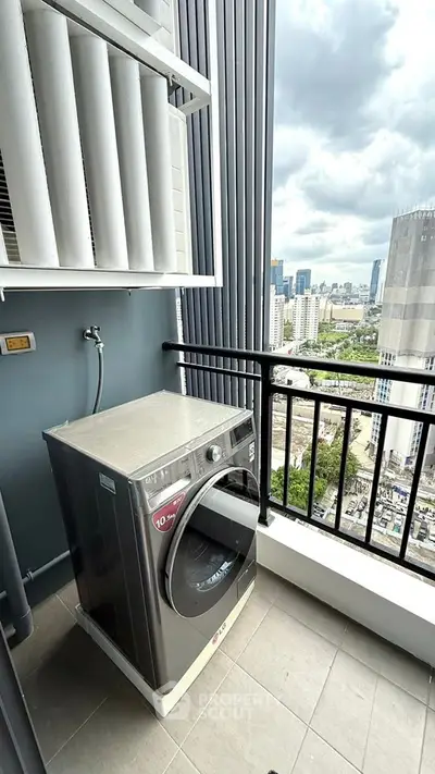Modern balcony with washing machine and city view, perfect for urban living convenience.