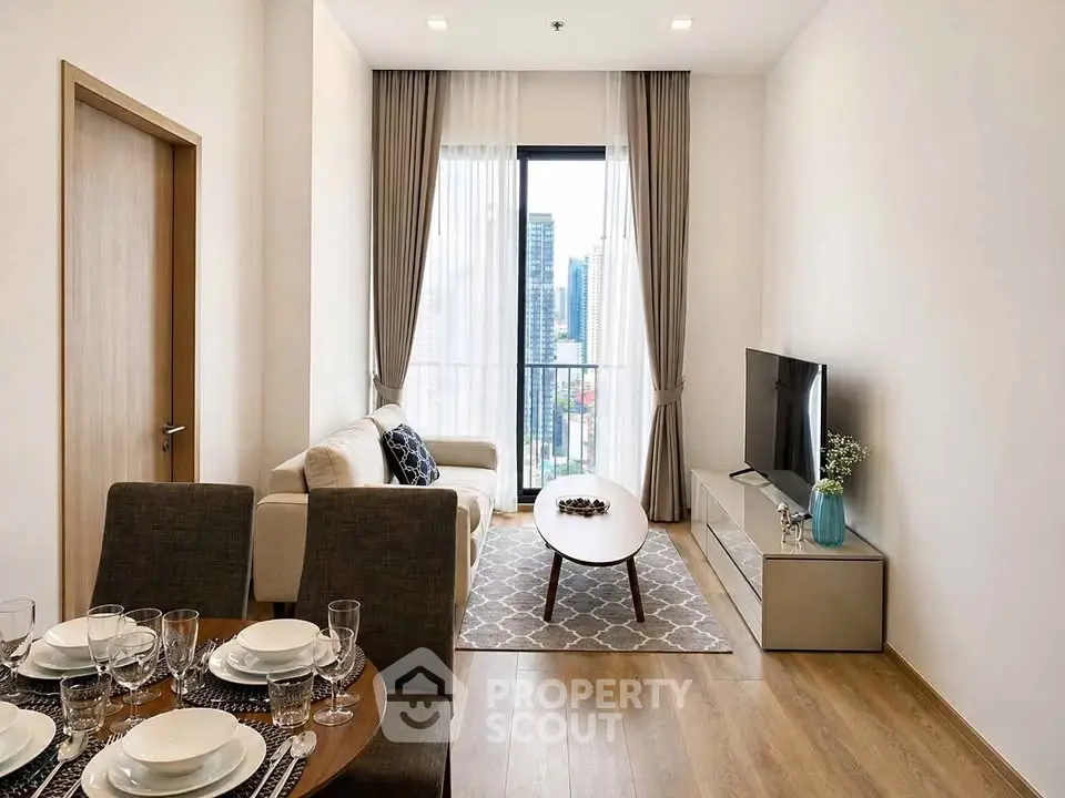 Modern living room with city view, stylish decor, and elegant dining setup in a high-rise apartment.