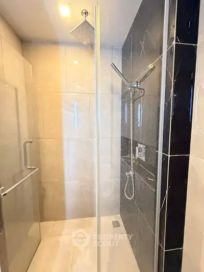 Modern bathroom with sleek shower design and elegant tile work