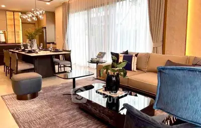 Luxurious modern living room with elegant dining area, stylish decor, and large windows for natural light.