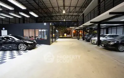 Spacious indoor parking area with modern design and ample lighting