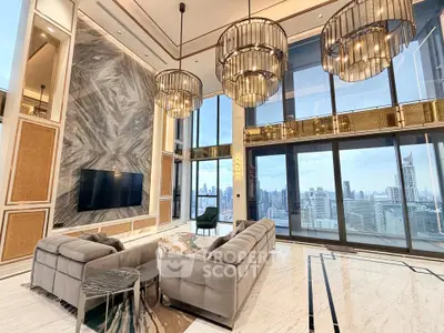 Luxurious high-rise living room with stunning city views and elegant chandeliers