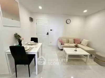 Modern living room with elegant dining area and cozy seating, perfect for urban living.