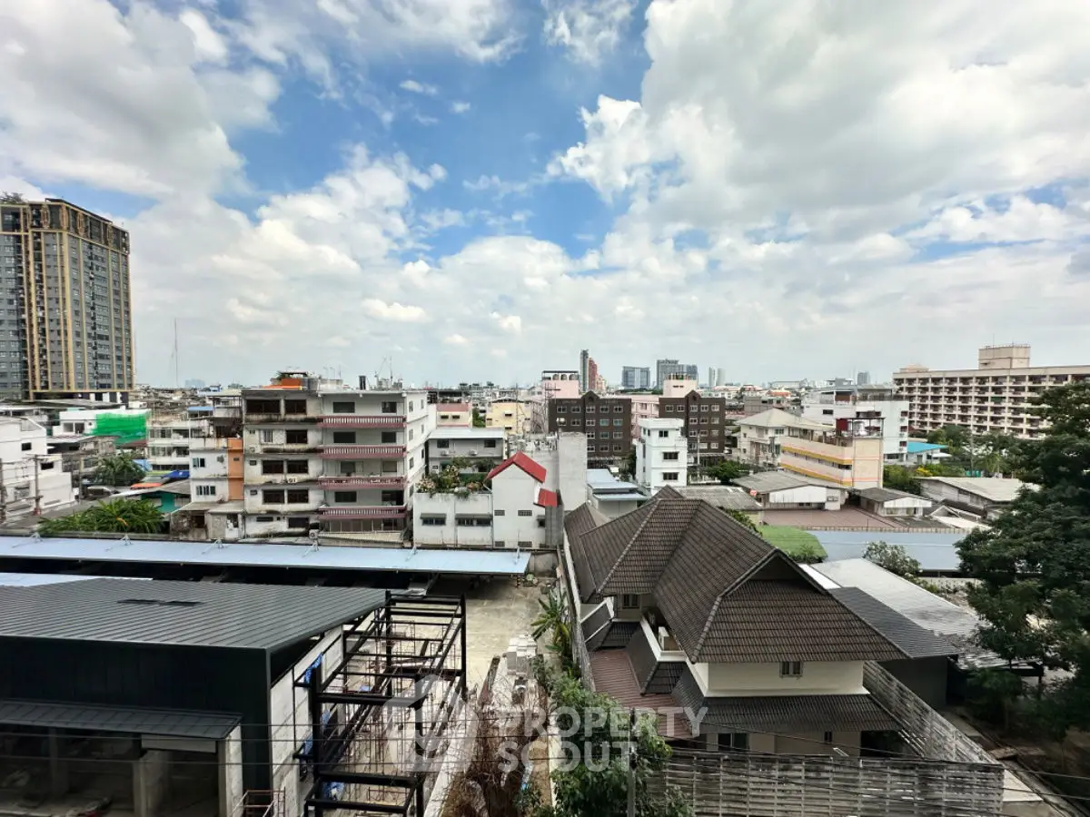 Stunning urban skyline view with diverse architecture under a vibrant sky.