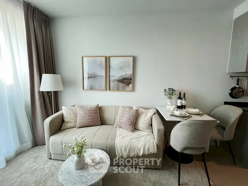 Chic modern living room with cozy sofa and elegant dining area, perfect for urban living.
