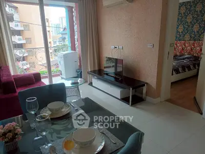 Modern apartment with open living room and balcony view