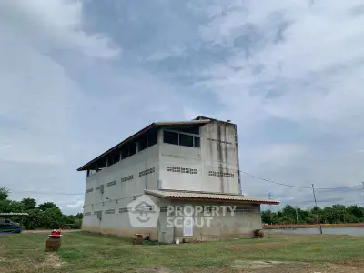 Unique three-story building with expansive outdoor space and potential for customization.