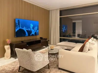 Luxurious living room with modern decor and stunning city view through large windows.