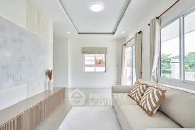 Modern living room with elegant decor and natural light