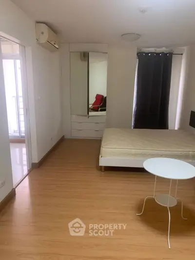 Modern bedroom with two beds and minimalist decor