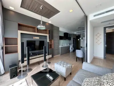 Modern living room with open kitchen and stylish decor
