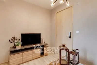 Modern living room with stylish TV stand and elegant lighting