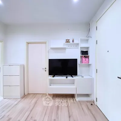 Modern living room with sleek TV unit and minimalist decor