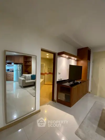 Modern apartment interior with sleek kitchen and cozy living area