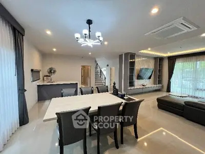 Spacious modern living room with dining area and stylish decor