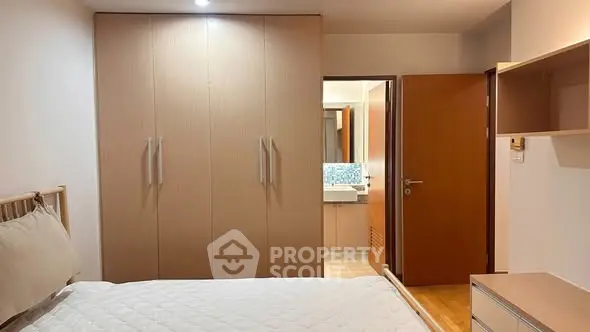 Cozy bedroom with ensuite bathroom and ample closet space