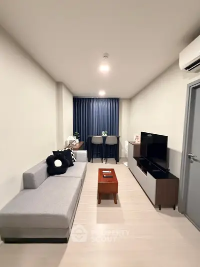 Modern living room with sleek furniture and stylish decor