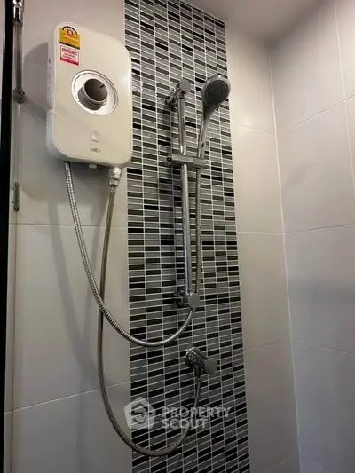 Modern bathroom with sleek shower design and stylish tile accents