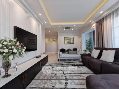 Luxurious living room with modern decor, plush seating, and elegant lighting for a sophisticated ambiance.