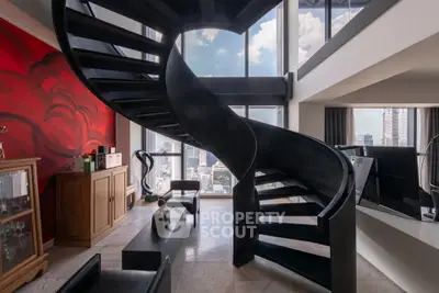 Luxurious modern living room with spiral staircase and city skyline view