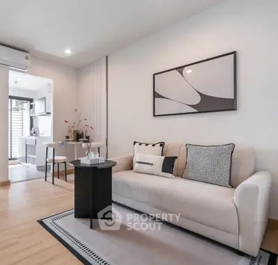 Modern living room with stylish decor and open kitchen layout