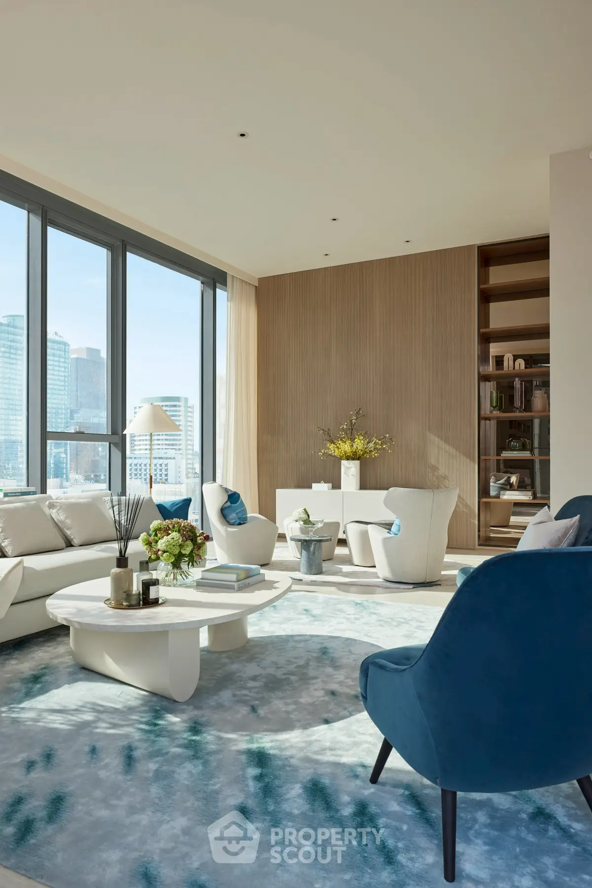 Luxurious living room with modern furniture and stunning city view