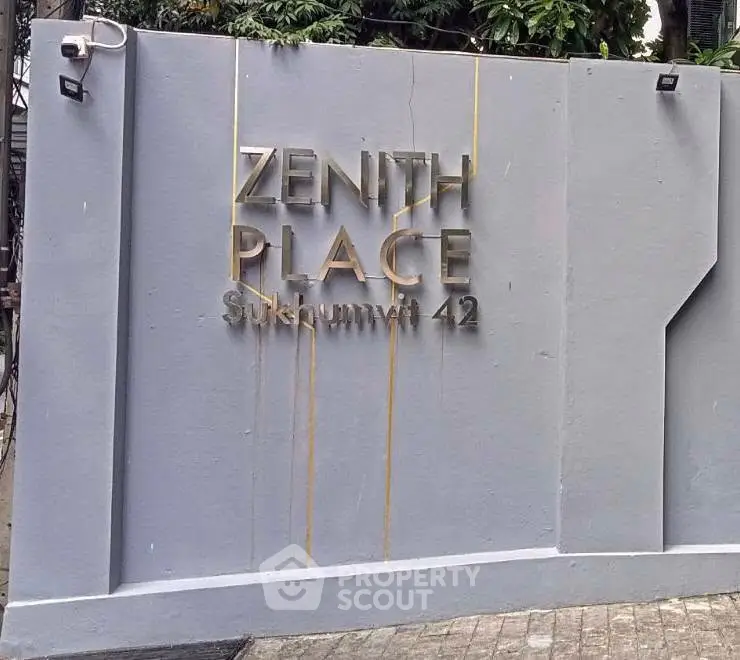 Zenith Place Sukhumvit 42 entrance sign with modern design and sleek lettering.