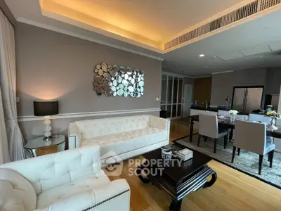 Luxurious modern living room with elegant decor and open kitchen layout