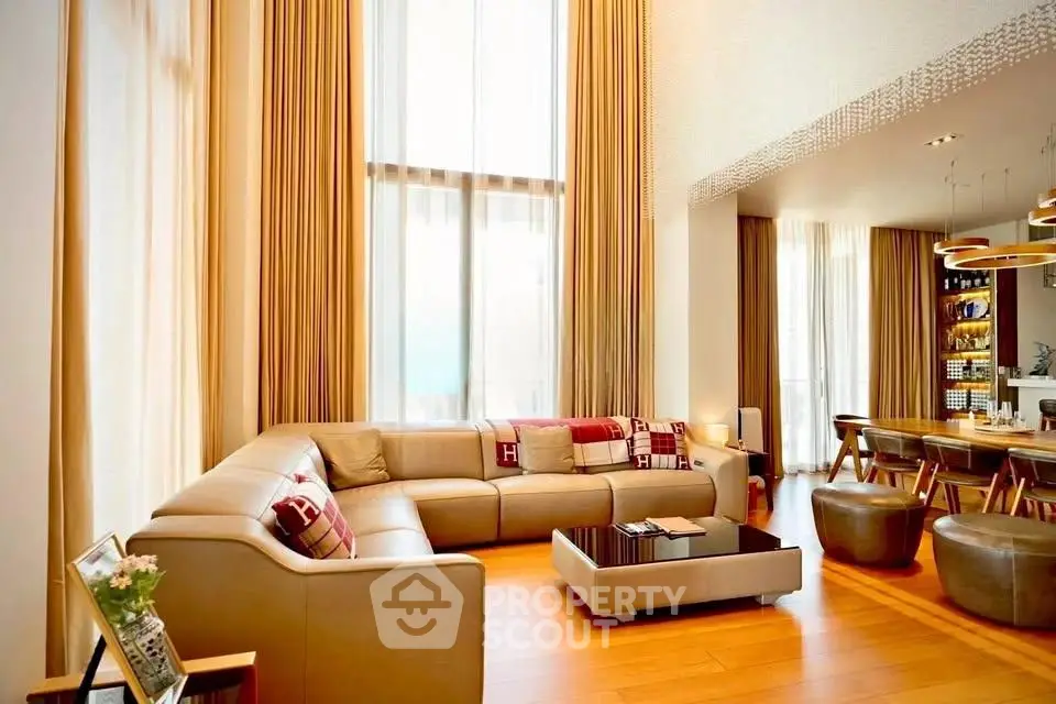 Luxurious living room with high ceilings and elegant decor in modern apartment