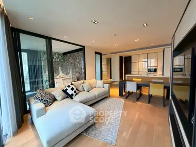 Luxurious modern living room with open kitchen and elegant decor