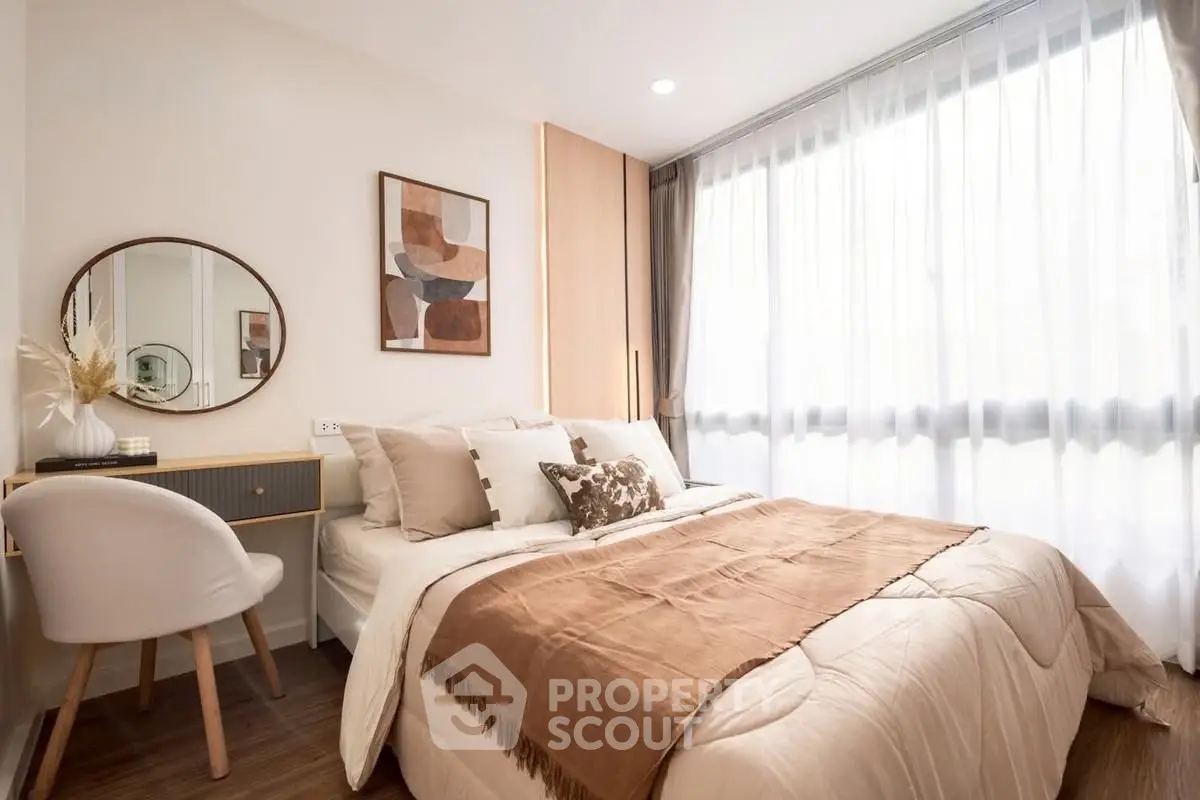 Cozy and stylish bedroom with natural light and modern decor