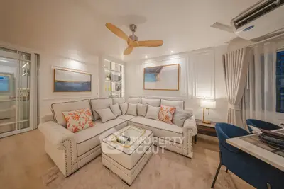 Luxurious living room with elegant decor and modern furniture, perfect for relaxation and entertainment.