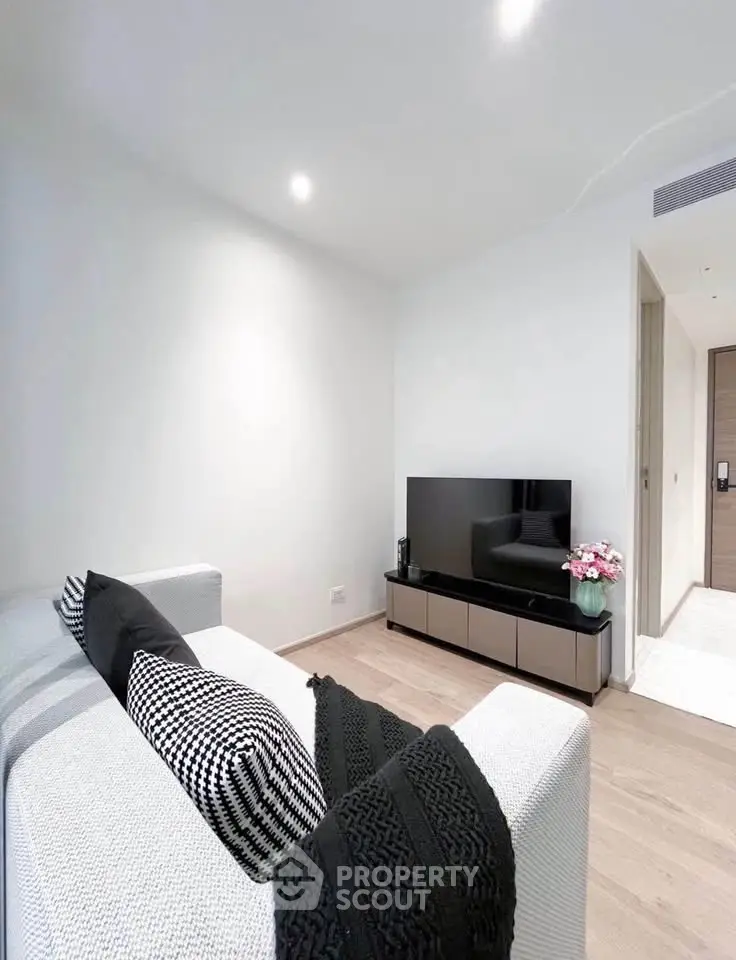 Modern living room with sleek furniture and minimalist decor