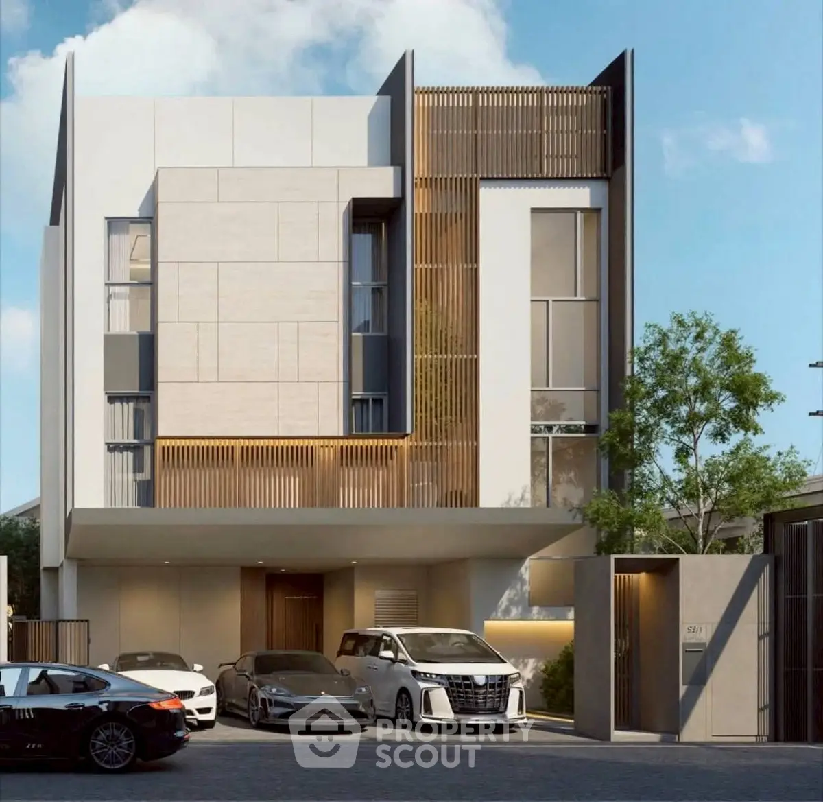 Modern luxury home with sleek facade and multiple car garage in upscale neighborhood.