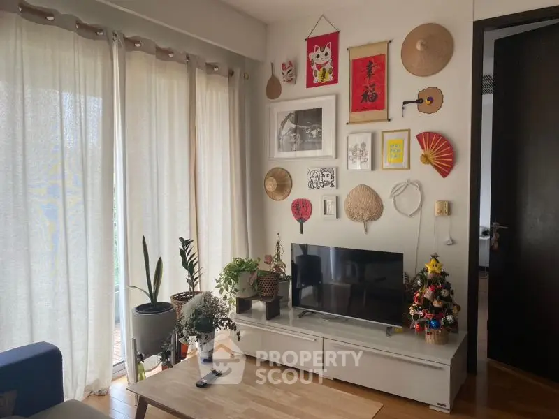 Charming living room with eclectic wall decor and natural light