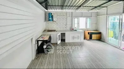 Spacious modern kitchen with open layout and sleek design