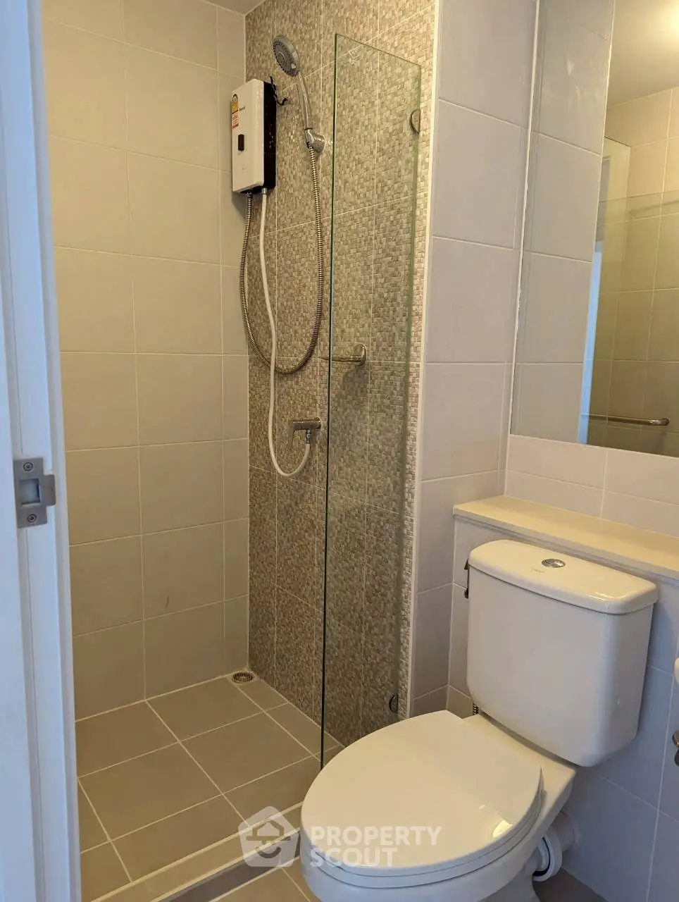 Modern bathroom with shower and toilet in sleek design