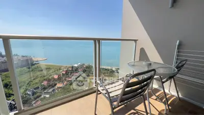 Stunning balcony with breathtaking ocean view, perfect for relaxation and enjoying the scenery.