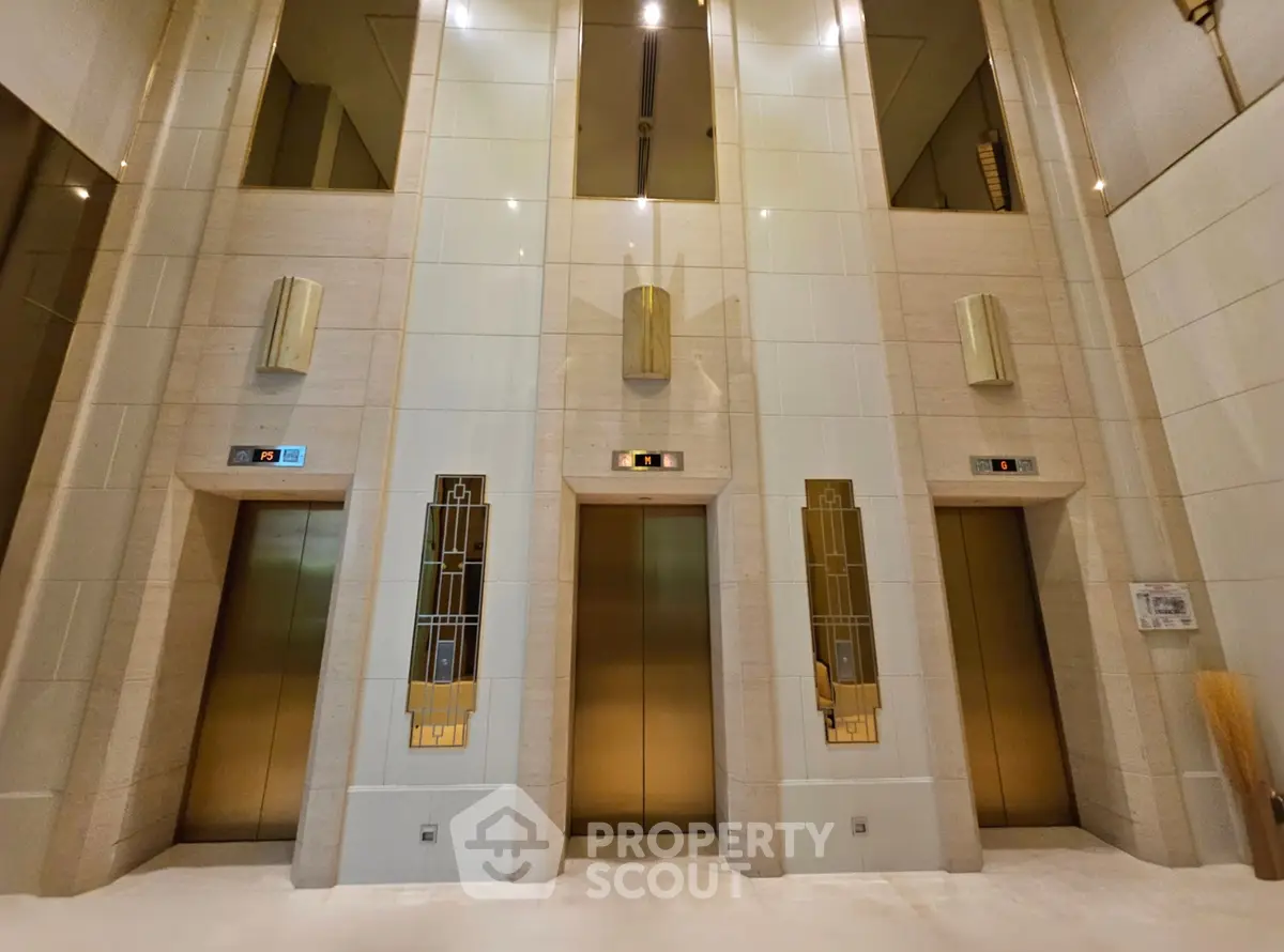Luxurious modern elevator lobby with elegant design and polished finishes.