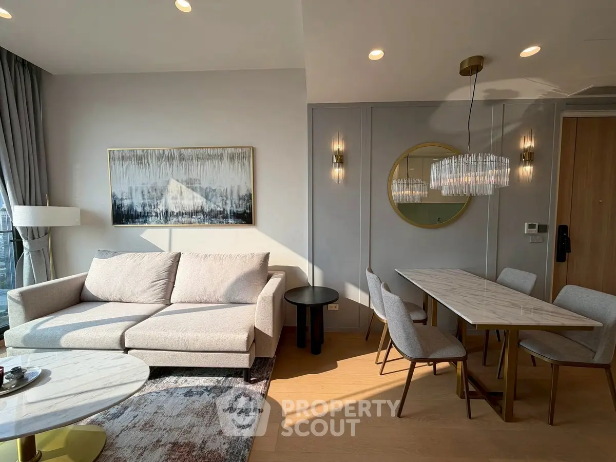 Modern living room with elegant dining area and stylish decor