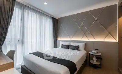 Modern bedroom with elegant design and natural light