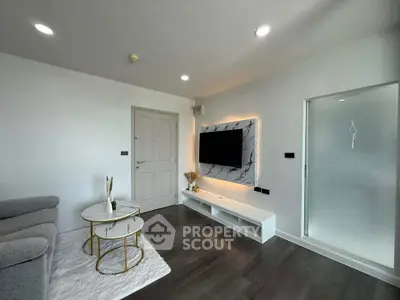 Modern living room with sleek TV setup and stylish decor