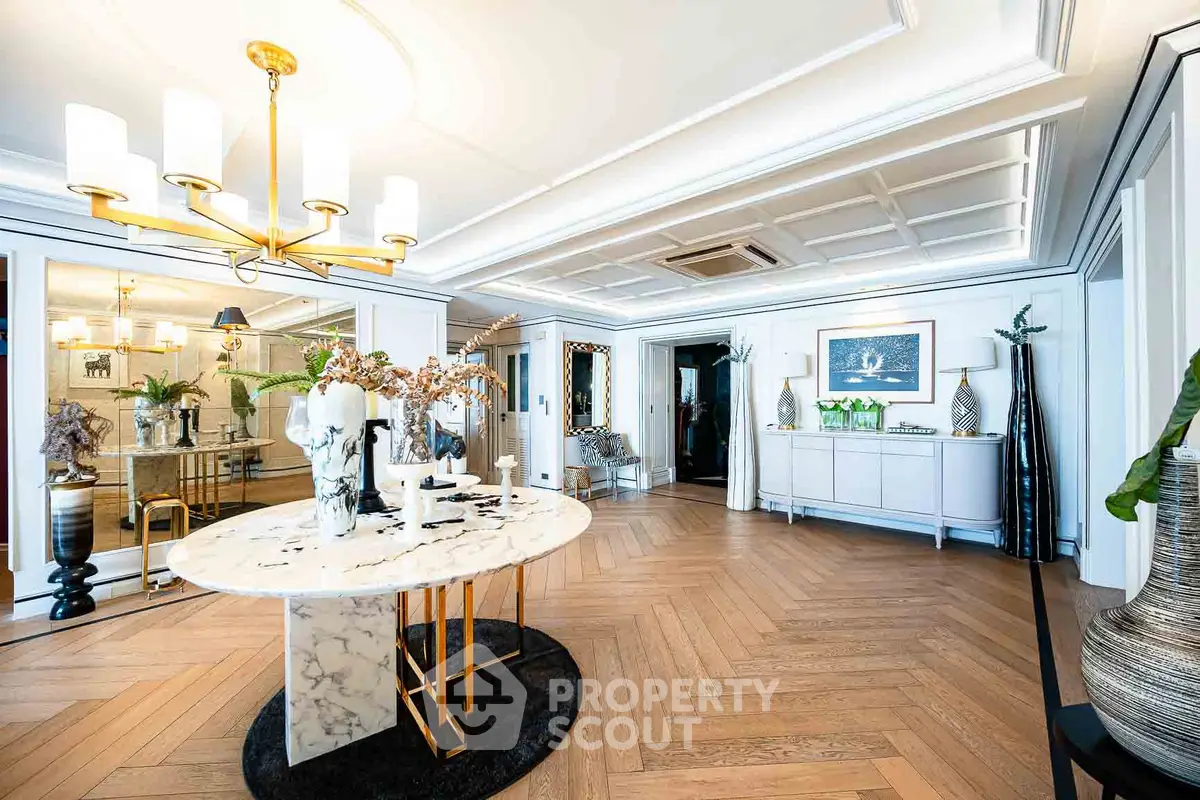 Luxurious living room with elegant decor and marble table in upscale apartment