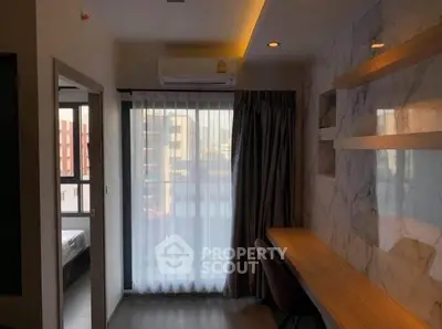 Modern study room with marble accent wall and natural light