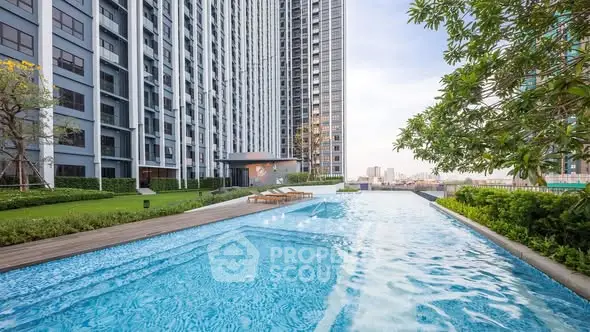 Luxurious high-rise apartment with stunning pool and garden view.