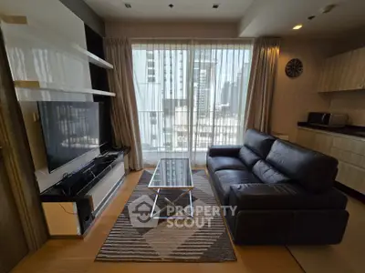 Modern living room with sleek furniture and city view